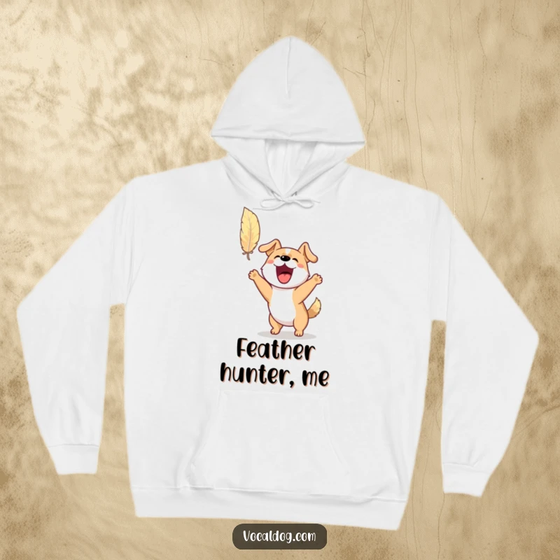 Funny hoodie depicting an excited dog barking and jumping playfully towards a floating feather, full of energetic anticipation.