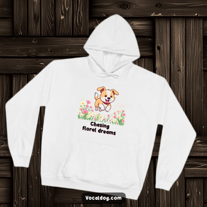 Funny hoodie depicting a happy dog bounding through a field of colorful flowers, exuding springtime joy and comfort.