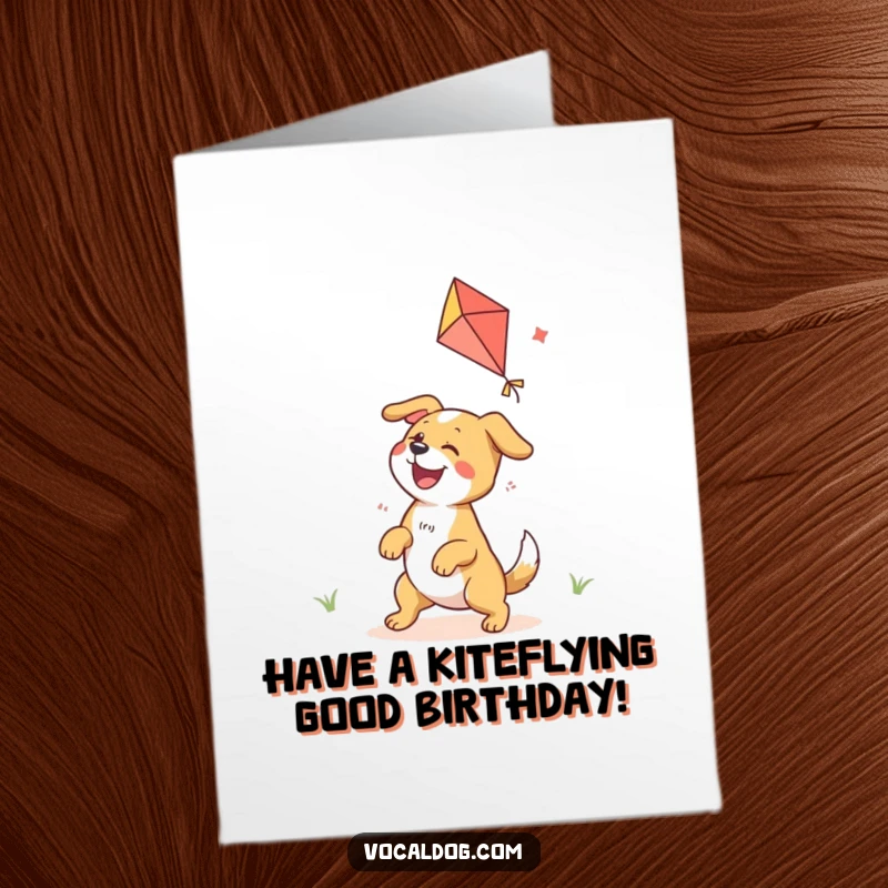 Funny Free Printable Birthday Card: An ecstatic dog joyfully plays with a colorful kite soaring high in the sky.